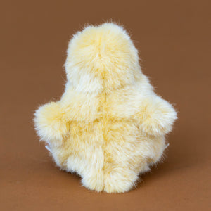 little-yellow-hen-chick-sitting-rear-with-tail