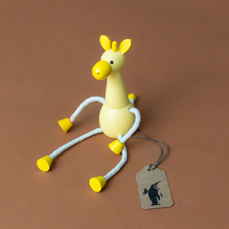 little-palimal-friend-yellow-giraffe-sitting-with-arms-and-legs-outstretched