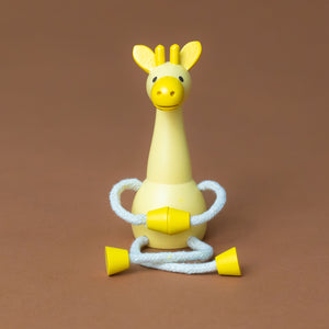 little-palimal-friend-yellow-giraffe-sitting-with-arms-connected-and-legs-in-yoga-pose
