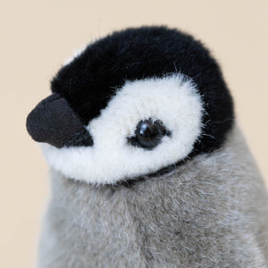 grey-black-white-little-penguin-chick-stuffed-animal-face-with-beak-and-eye-detail