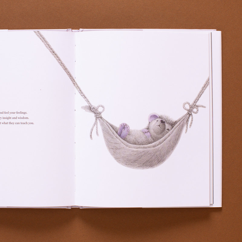 living-brave--how-to-add-more-confidence-to-your-courage open page with hedgehog in a hammock