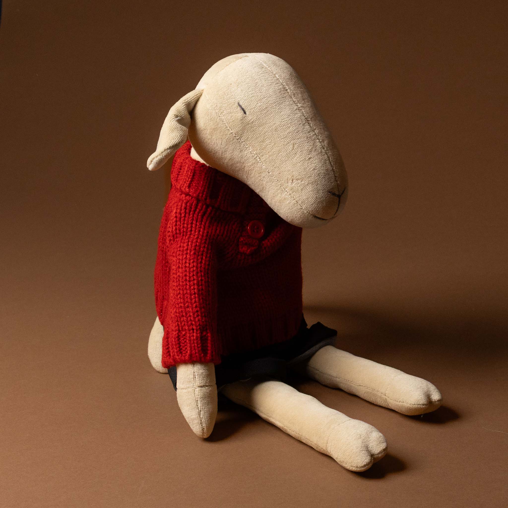 maia-the-grande-white-sheep-red-pullover-and-black-jeans