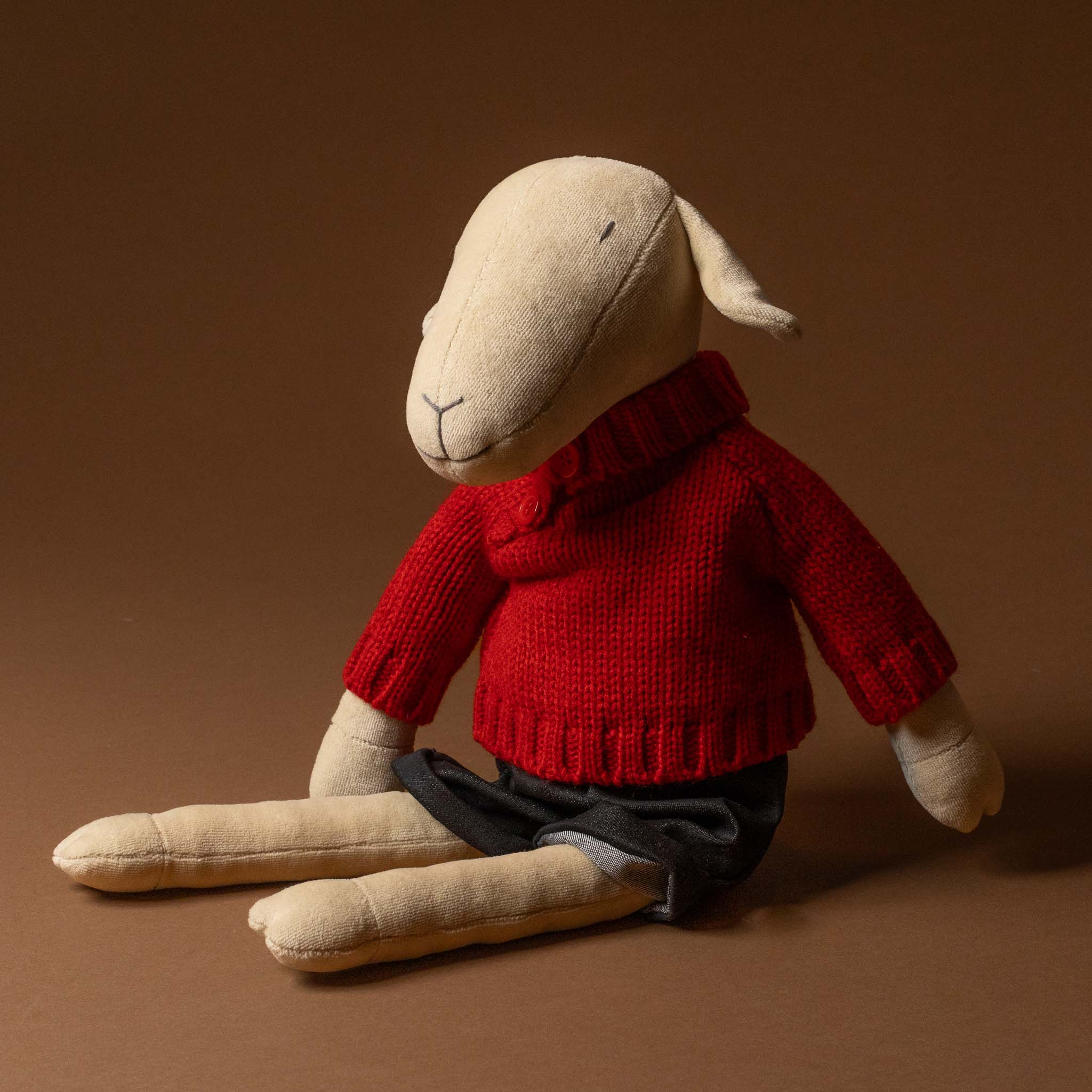 maia-the-grande-white-sheep-red-pullover-and-black-jeans