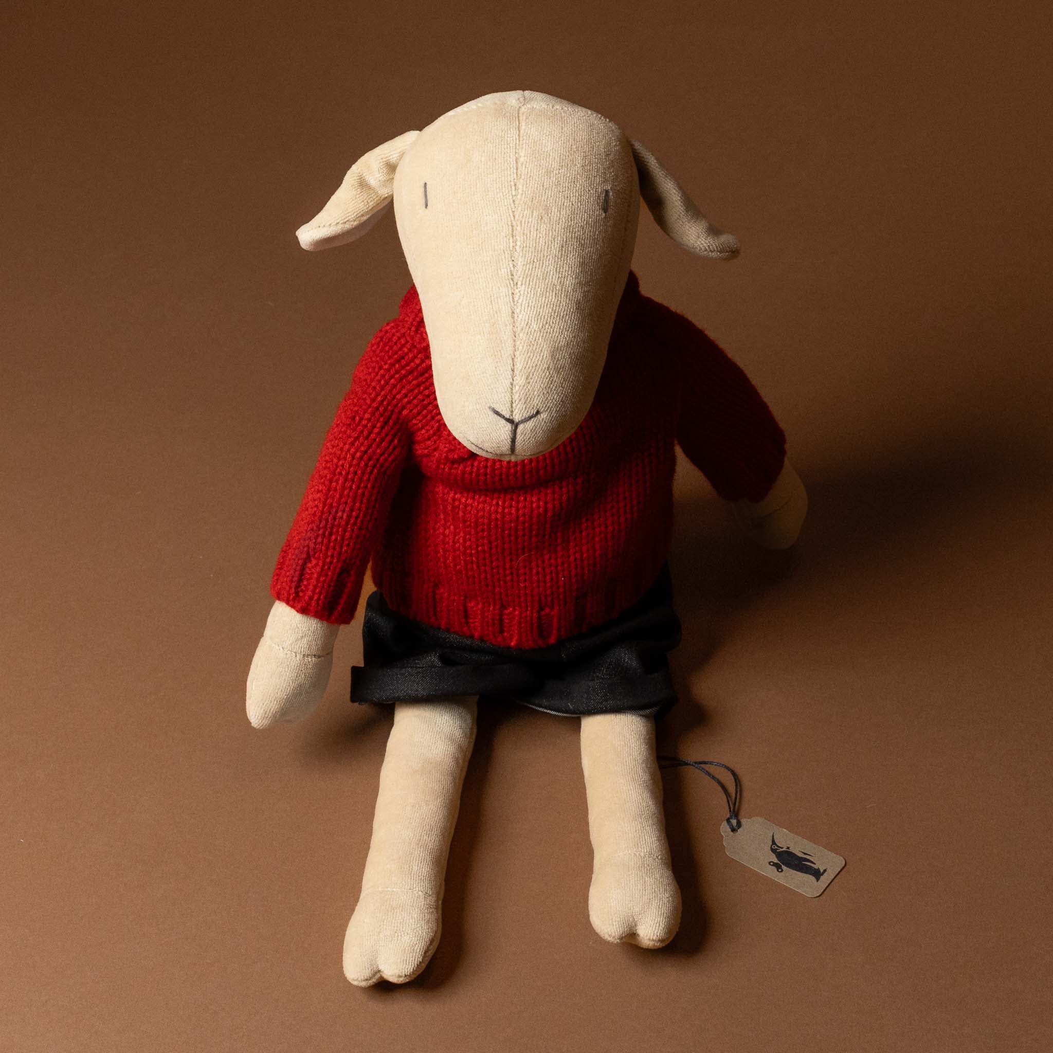 maia-the-grande-white-sheep-red-pullover-and-black-jeans