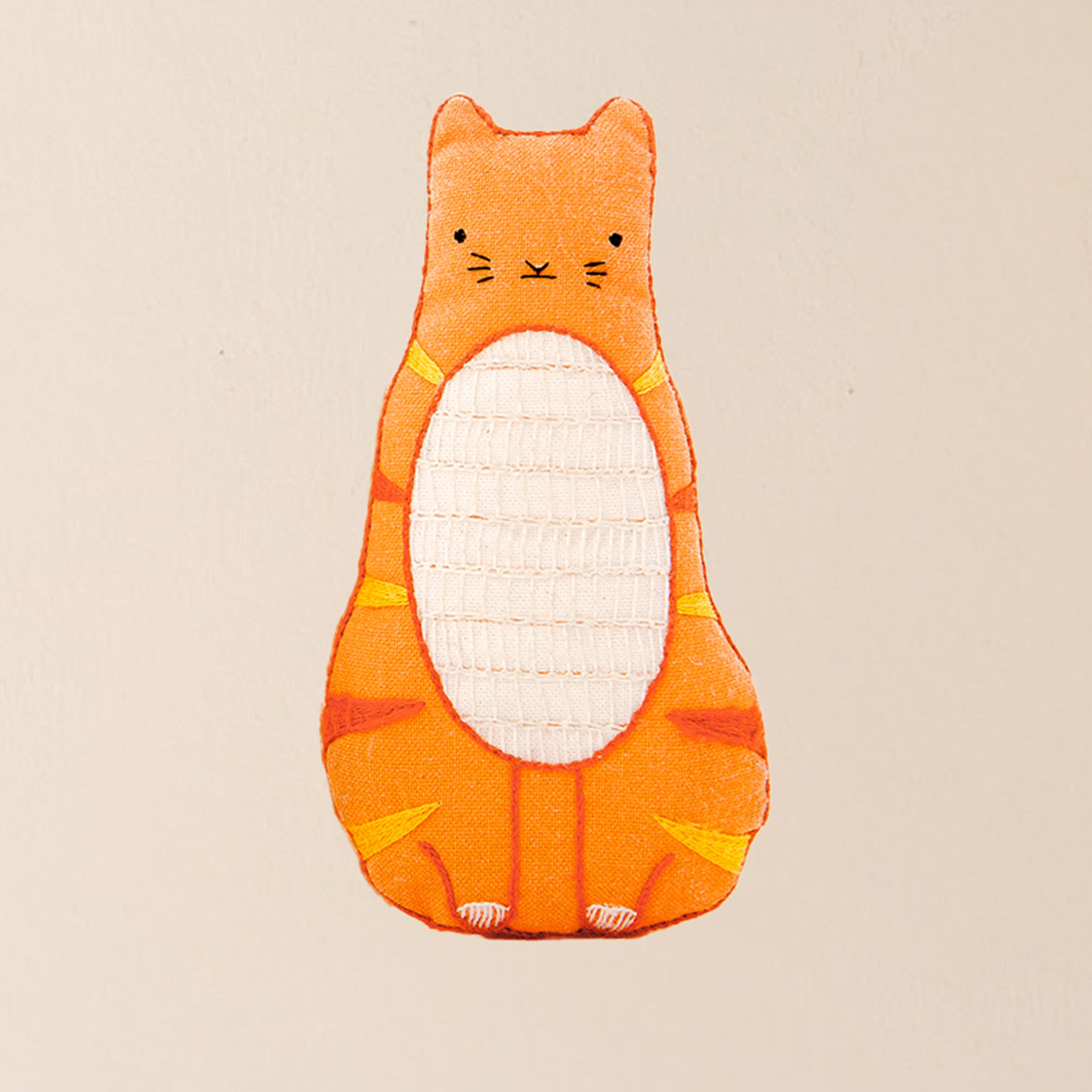 make-your-own-embroidered-animal-kit-tabby-striped-cat-finished-orange-plushie