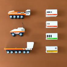 Load image into Gallery viewer, white-with-colorful-striped-space-modules-with-rover-vehicles-and-trailer-marge-vehicles-play-set-dark-depths