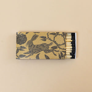 black-tipped-matches-in-black-and-gold-box-with-rabbit-print