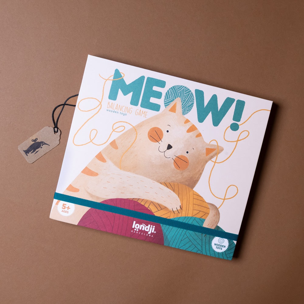 Board game box titled 'MEOW!' with a cat illustration on a brown background