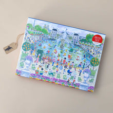 Load image into Gallery viewer, michael-storrings-1000-piece-springtime-in-paris-puzzle-box-with-boats-floating-in-a-fountain-and-people-strolling-in-a-park