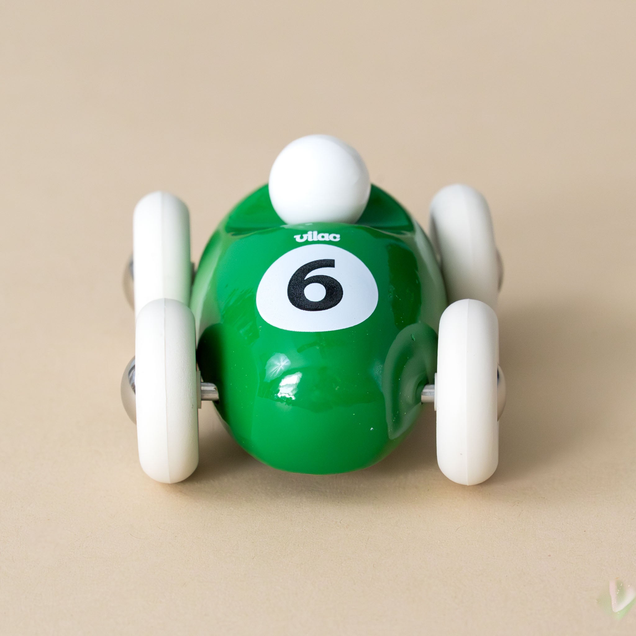 miniature-wooden-roadster-green-number-6-with-white-wheels-front