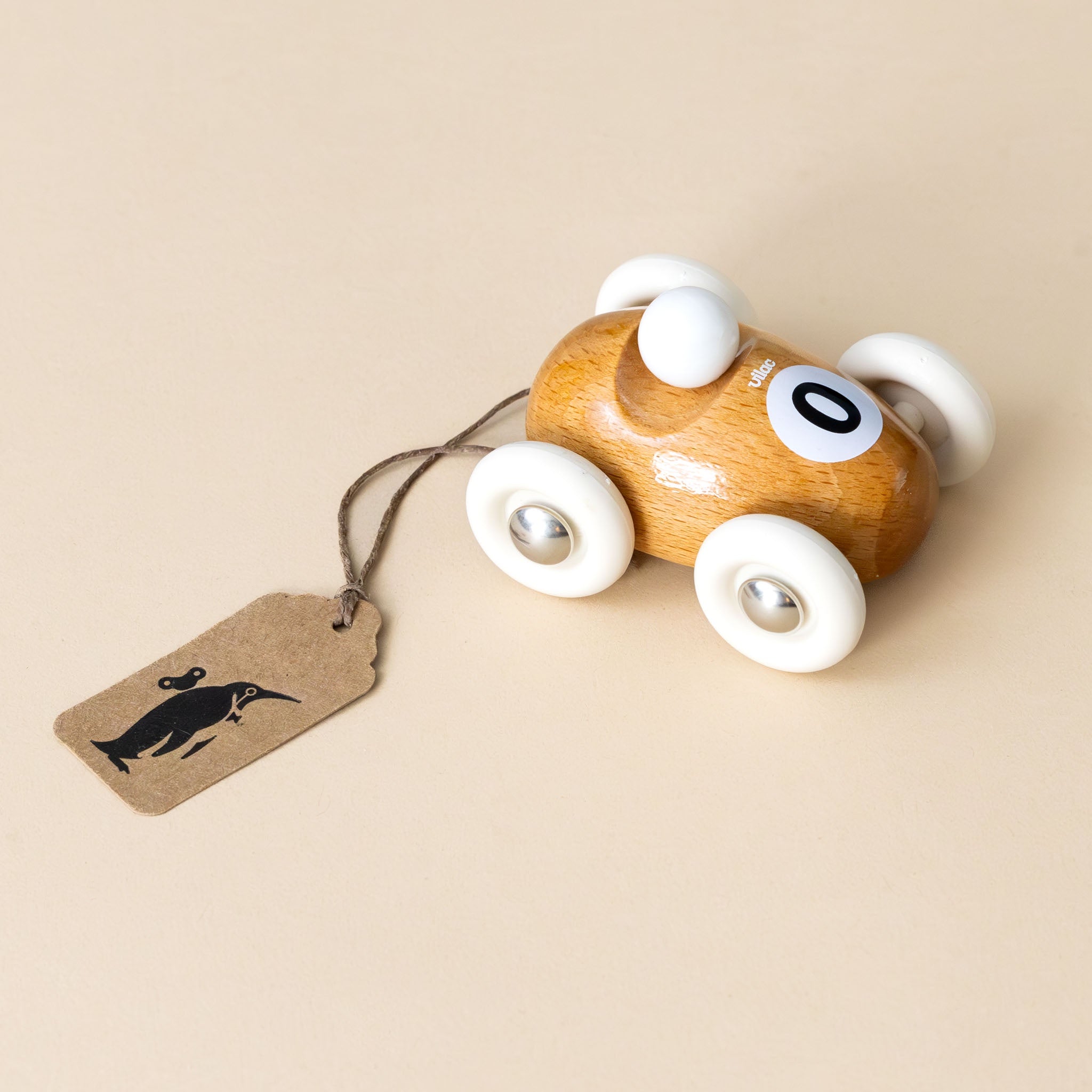 miniature-wooden-roadster-natural-number-zero-white-wheels