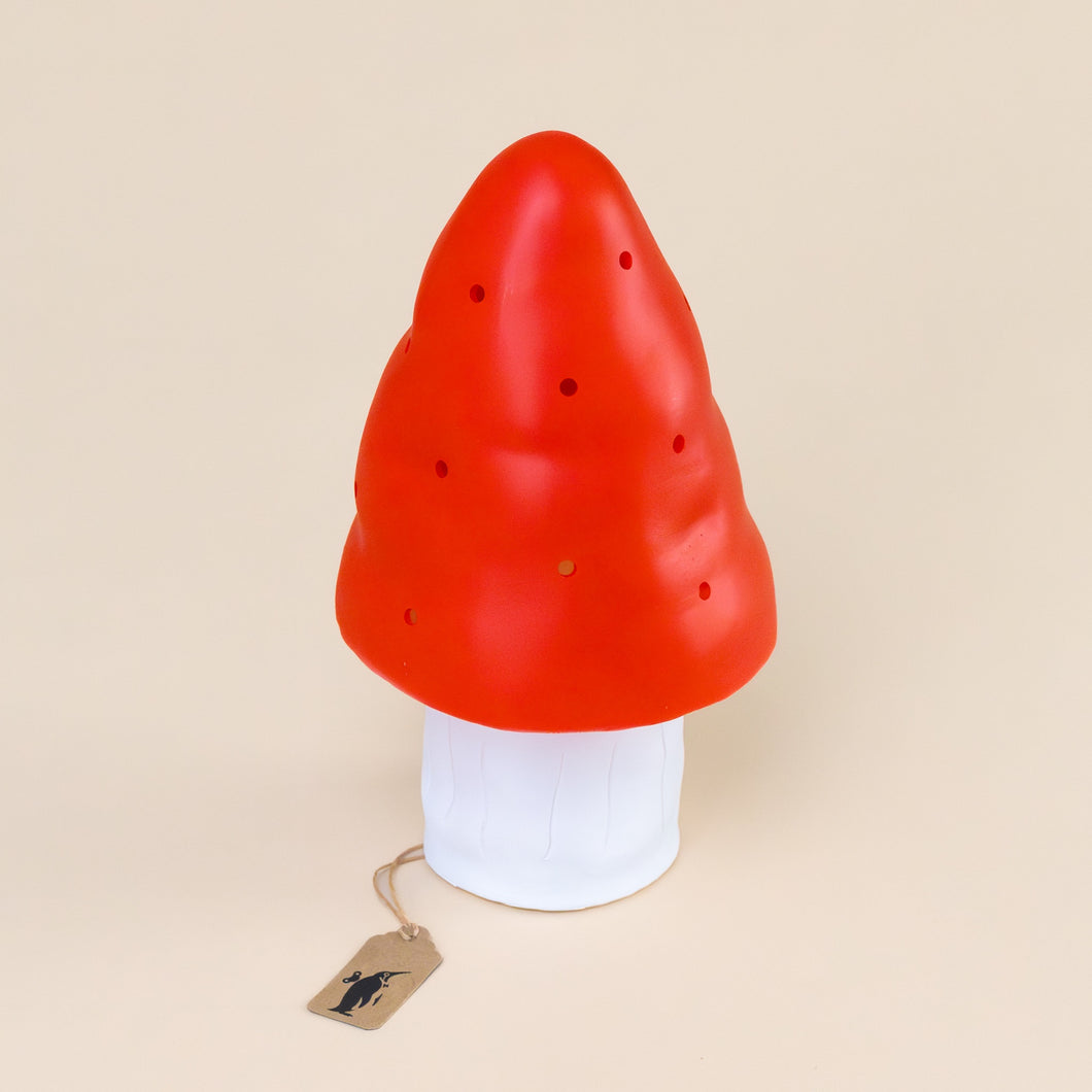 mushroom-lamp--small-white-base-with-red-top-with-small-holes-to-dapple-light