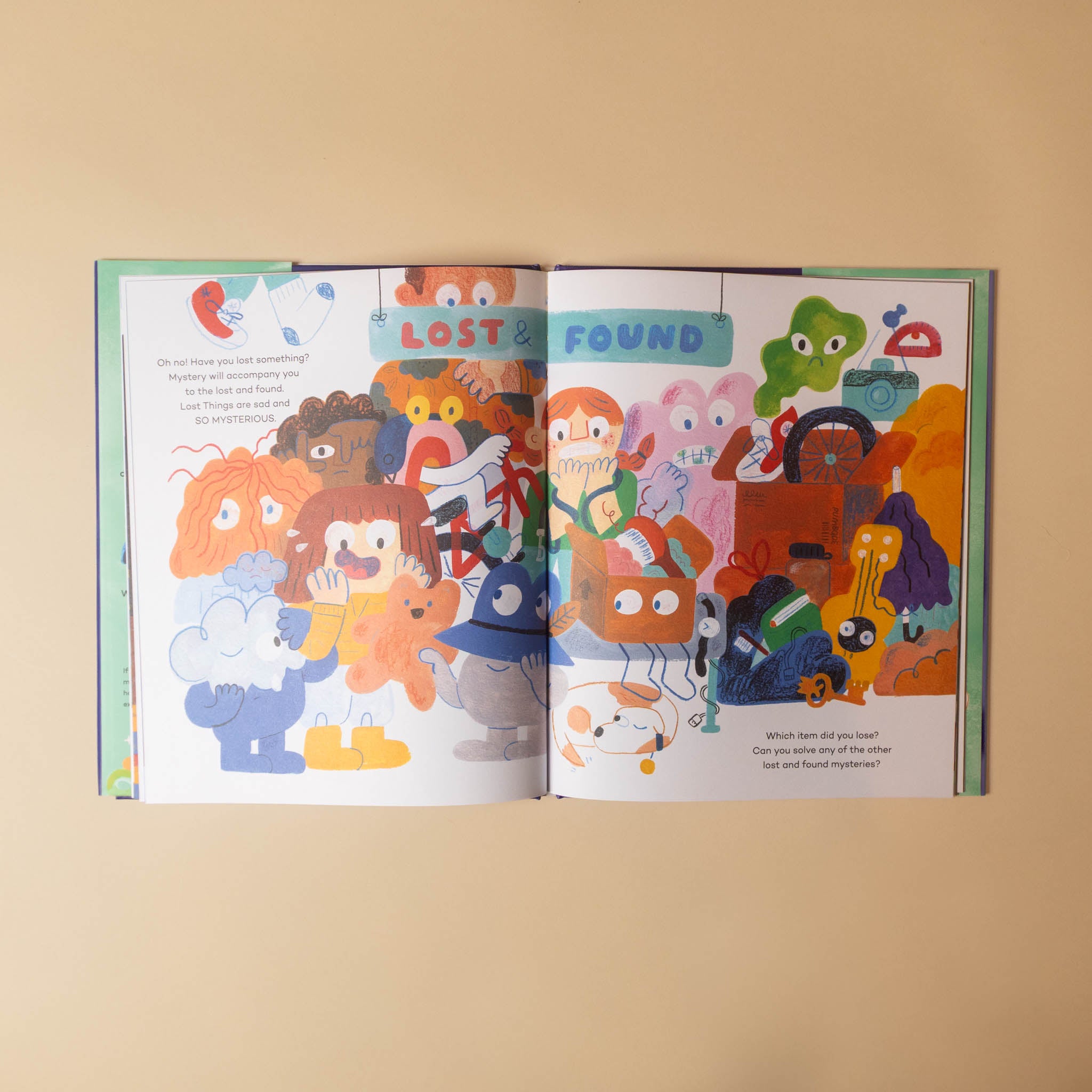 An open children's picture book spread on a warm beige background. The pages feature colorful cartoon characters and playful illustrations, with the words 'LOST & FOUND' at the top.