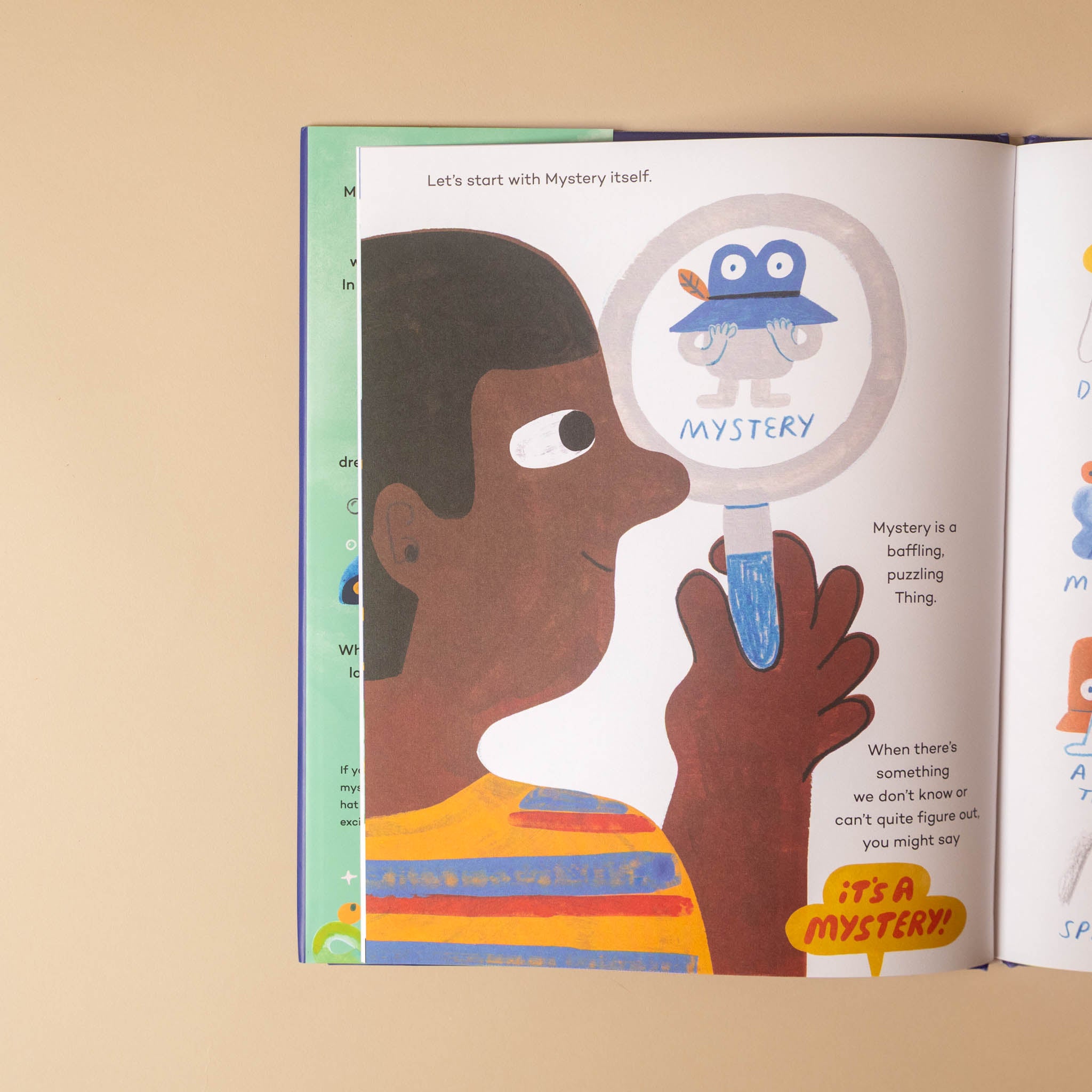 An open children's book spread on a warm beige background, showing an illustrated page with a child holding a magnifying glass and a blue mystery object inside the lens. The page includes text and colorful illustrations.