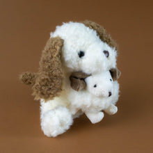 Load image into Gallery viewer, nafi-and-baby-puppy-brown-and-white-with-puppy-in-nafis-arms