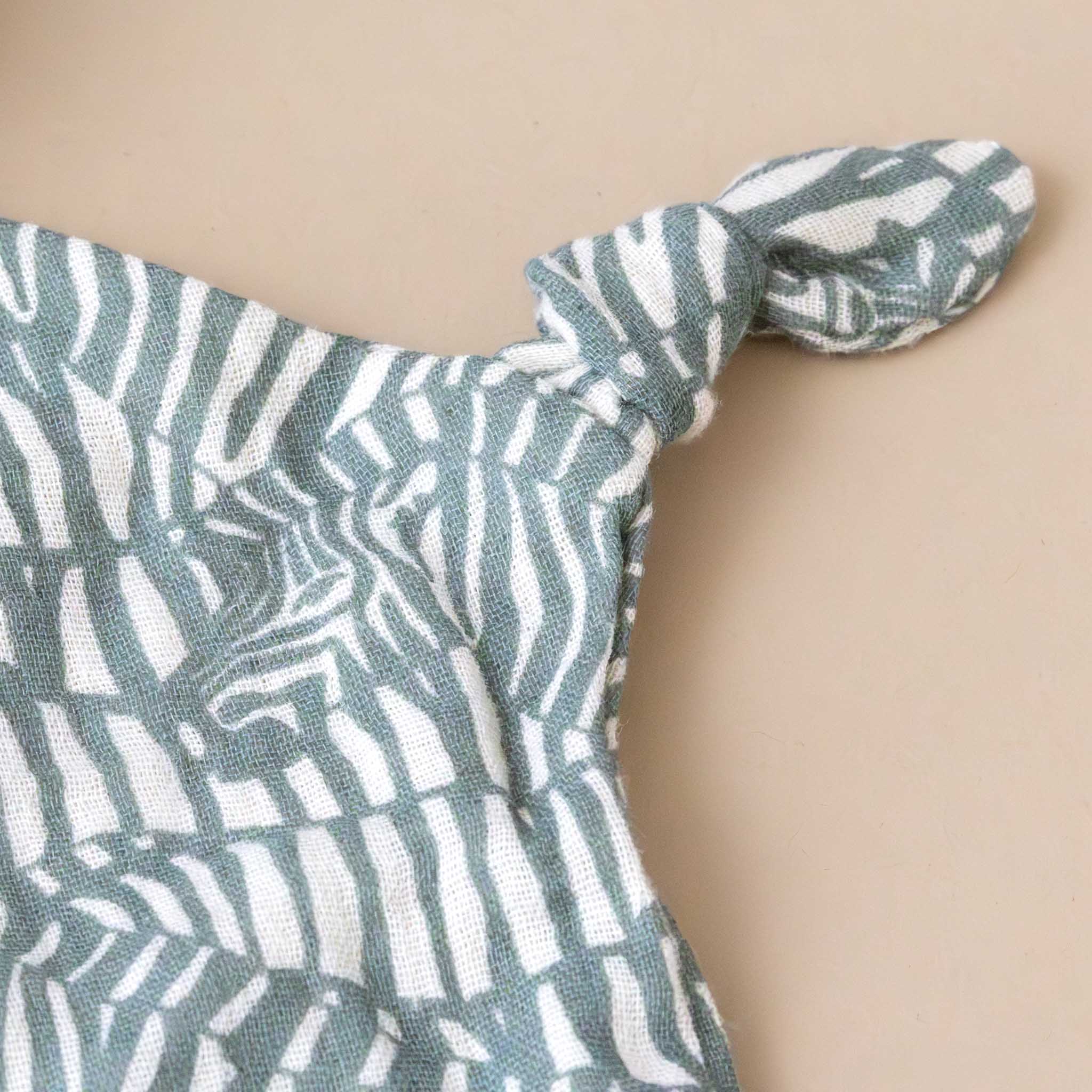 organic-cotton-bear-lovie-sage-zebras-knotted-limb