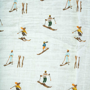 detail-showing-print-of-skiers-on-white-background