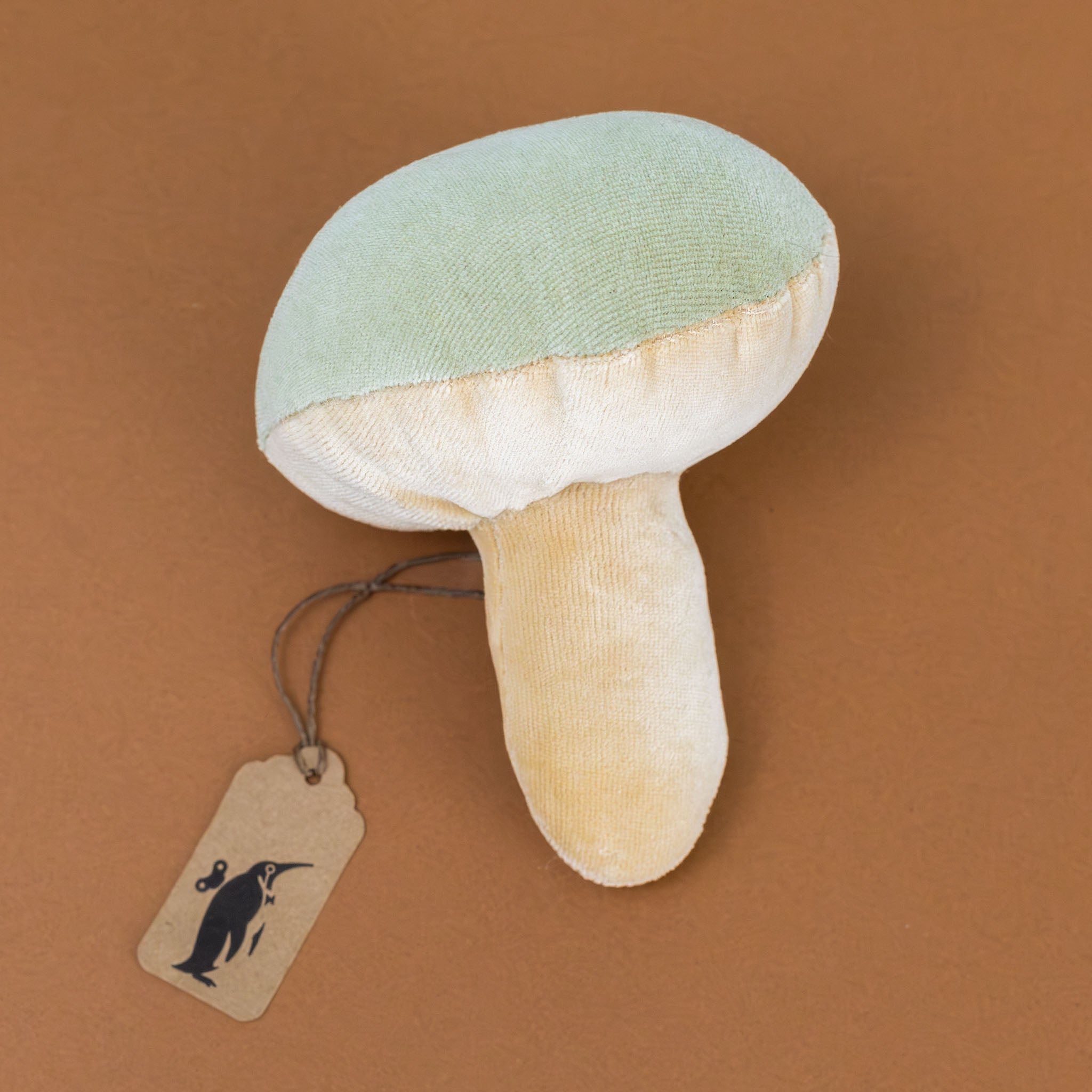 organic-cotton-mushroom-rattle-moss-and-beige