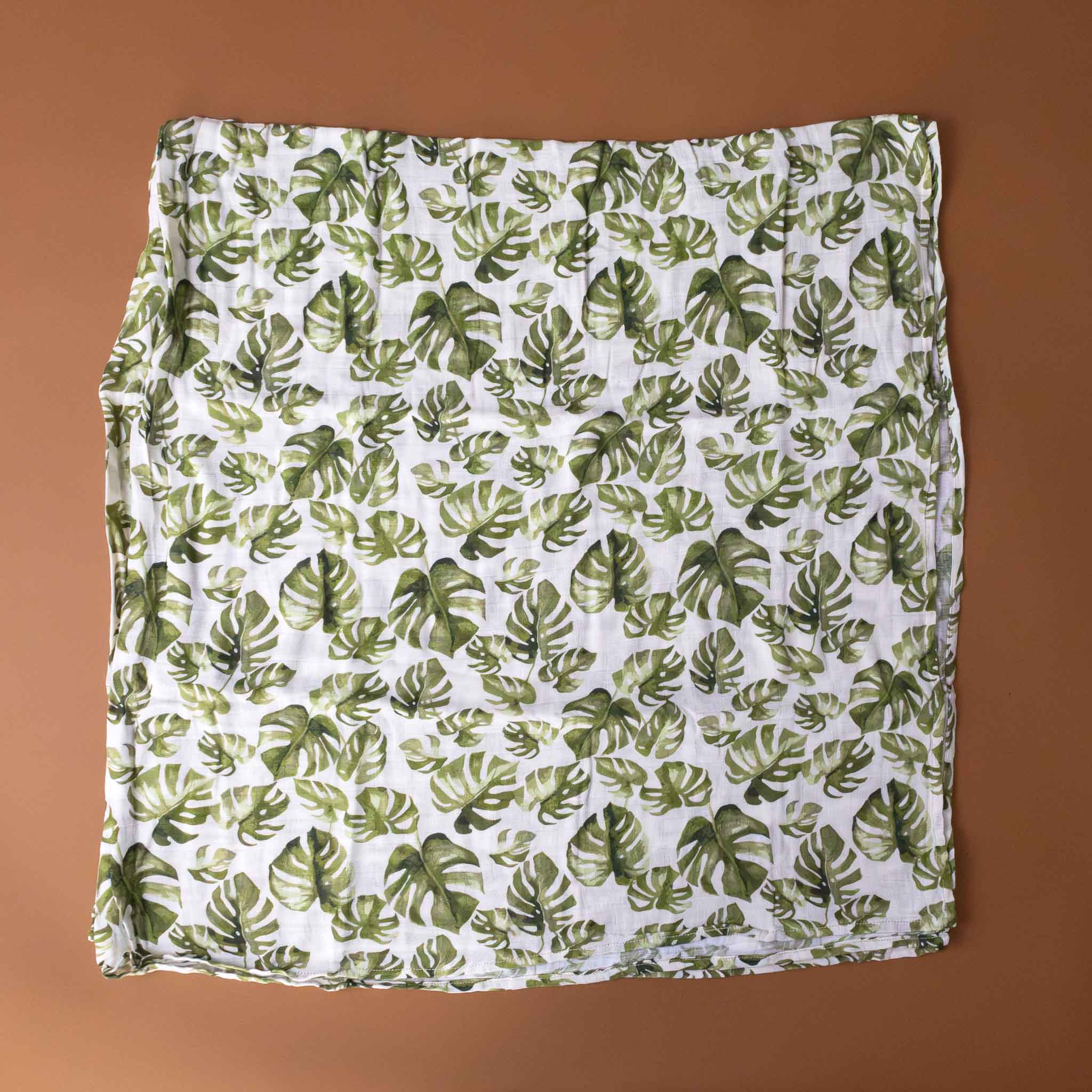 organic-cotton-swaddle-monstera-leaf