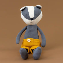 Load image into Gallery viewer, organic-knit-woodland-pal-benny-badger-yellow-shorts-stuffed-animal