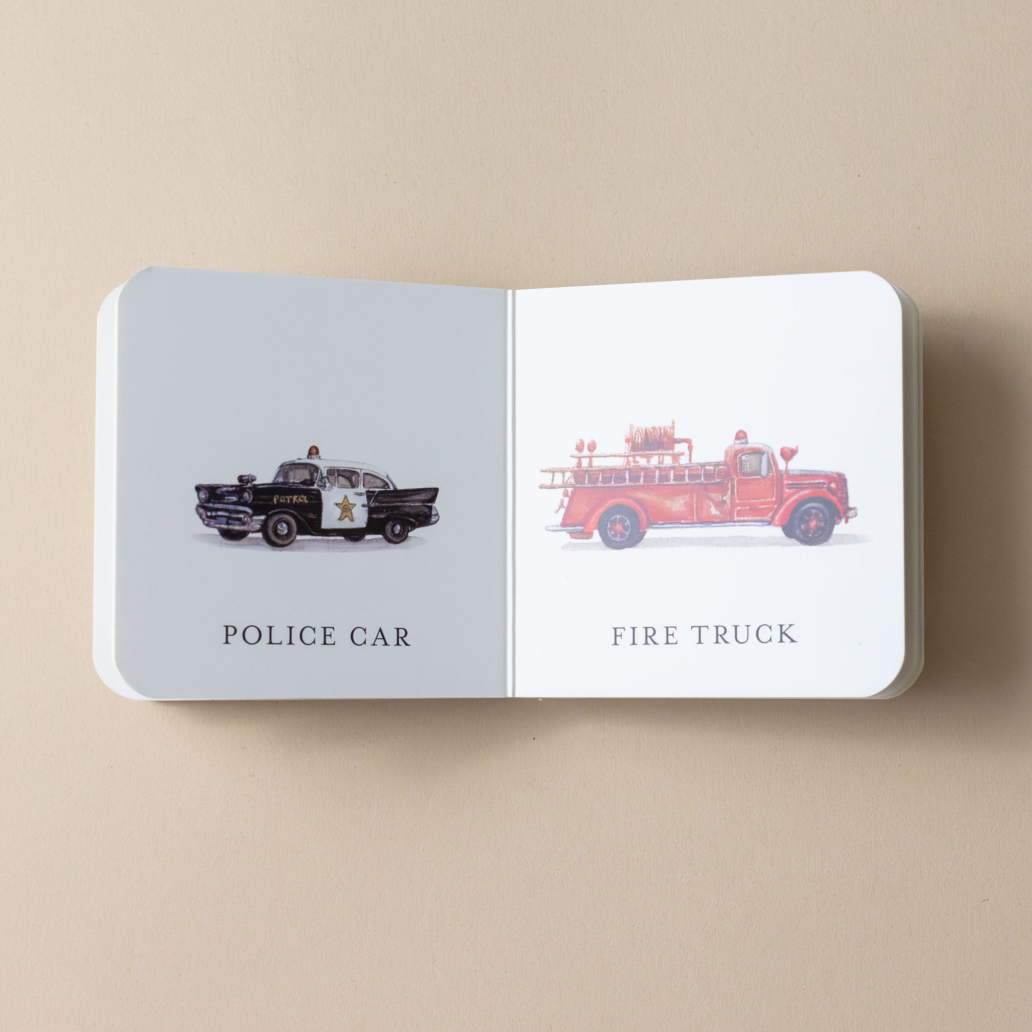 interior-page-with-drawing-and-illustration-of-police car-and-fire-truck