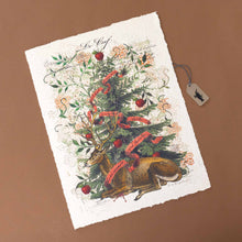 Load image into Gallery viewer, paper-print-these-woods-christmas-tree-with-a-deer-laying-at-the-base-and-red-ribbon-strewn-around-with-apples-as-ornaments-and-flowers-and-branches-as-ornaments