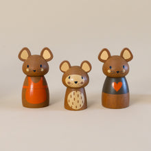 Load image into Gallery viewer, three-wooden-mice-dolls-with-a-mom-with-an-apron-dad-with-a-heart-sweater-and-a-child