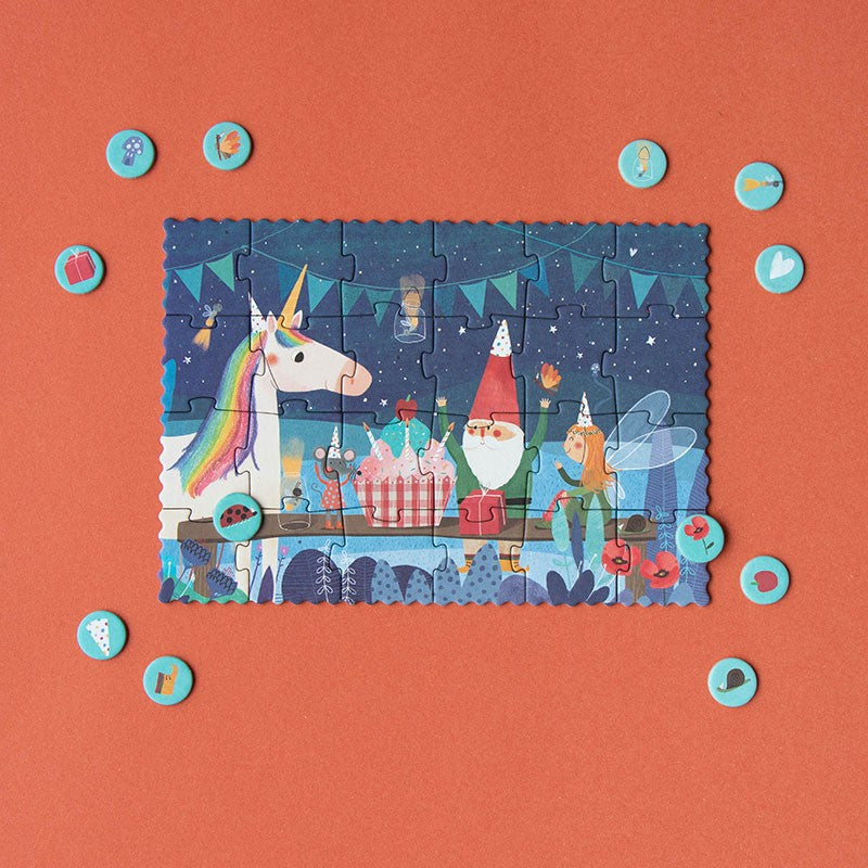 petite-24-piece-observation-puzzle-unicorn Children's puzzle with a unicorn and fairy design game pieces on an orange background