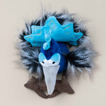 Load image into Gallery viewer, peacock-blue-plume-and-crown-surrounded-by-grey-black-feather-fluff