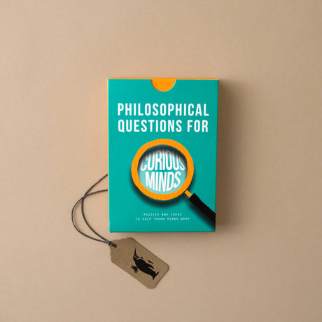 philosophical-questions-for-curious-minds-box-with-a-magnifying-glass-expanding-the-words-curious-minds