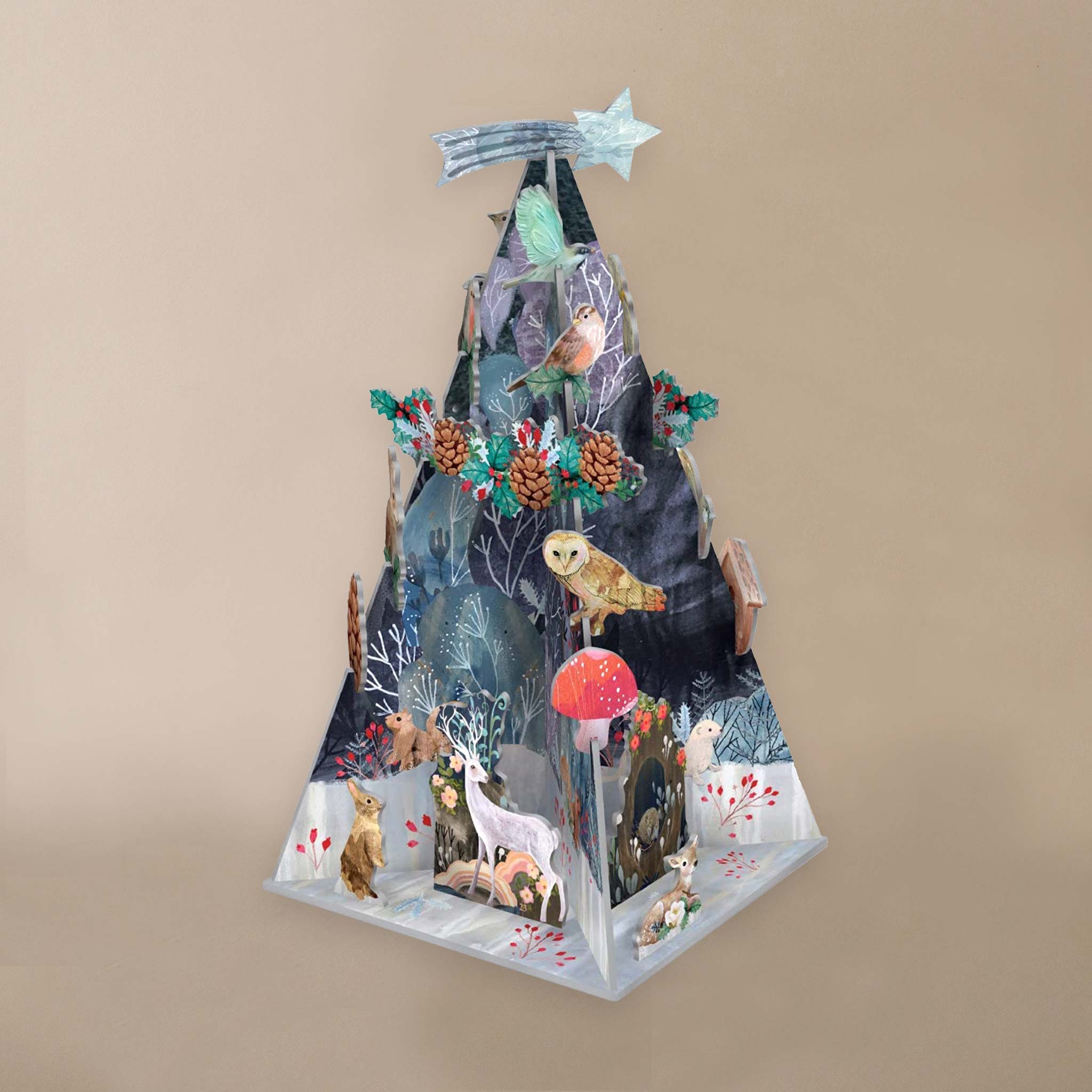 Decorative Christmas tree with animal-themed decorations on a beige background
