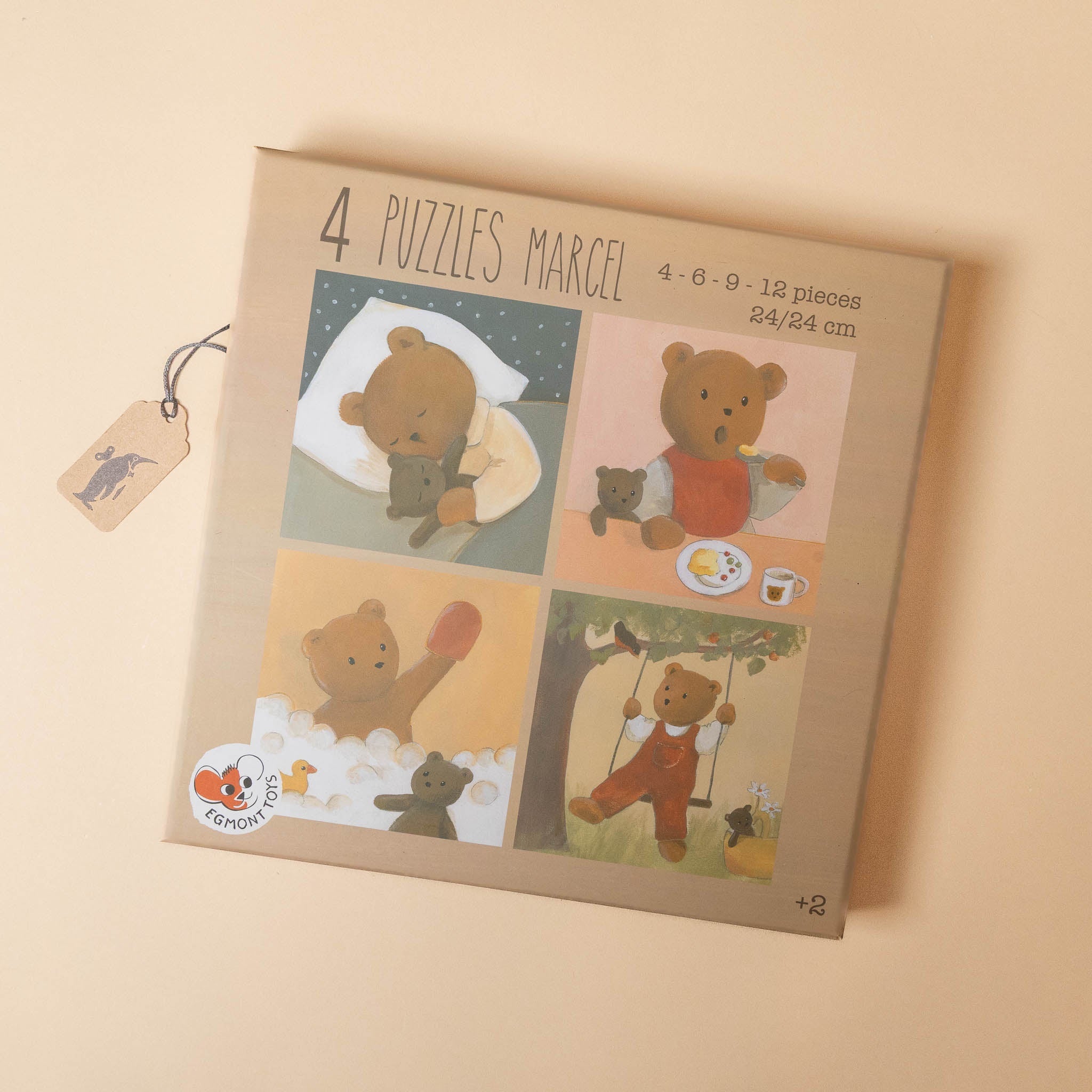 Box of '4 Puzzles Marcel' with bear illustrations on a beige background