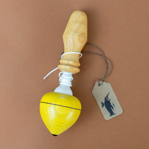 pull-string-wooden-spinning-top-with-yellow-base