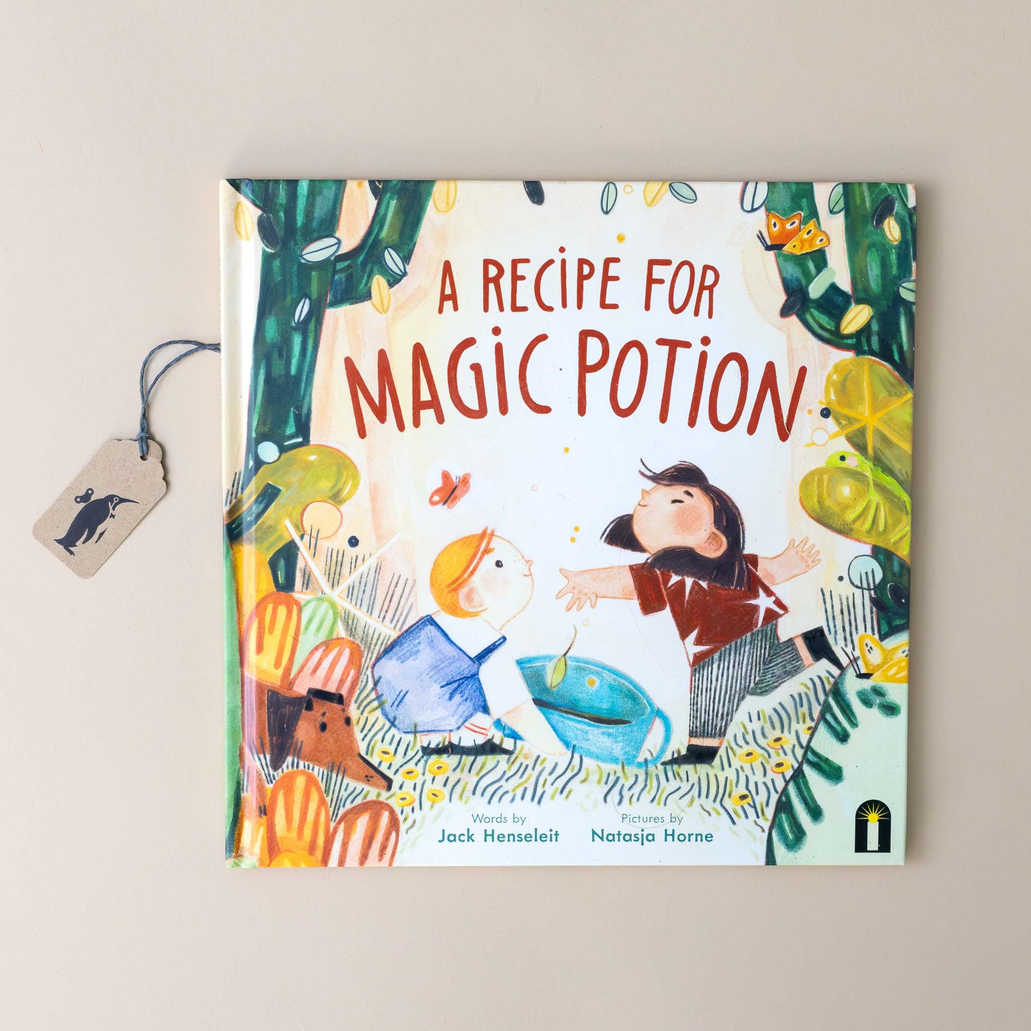 recipe-for-magic-potion-cover-with-two-children-mixing-items-as-wildlife-looks-on