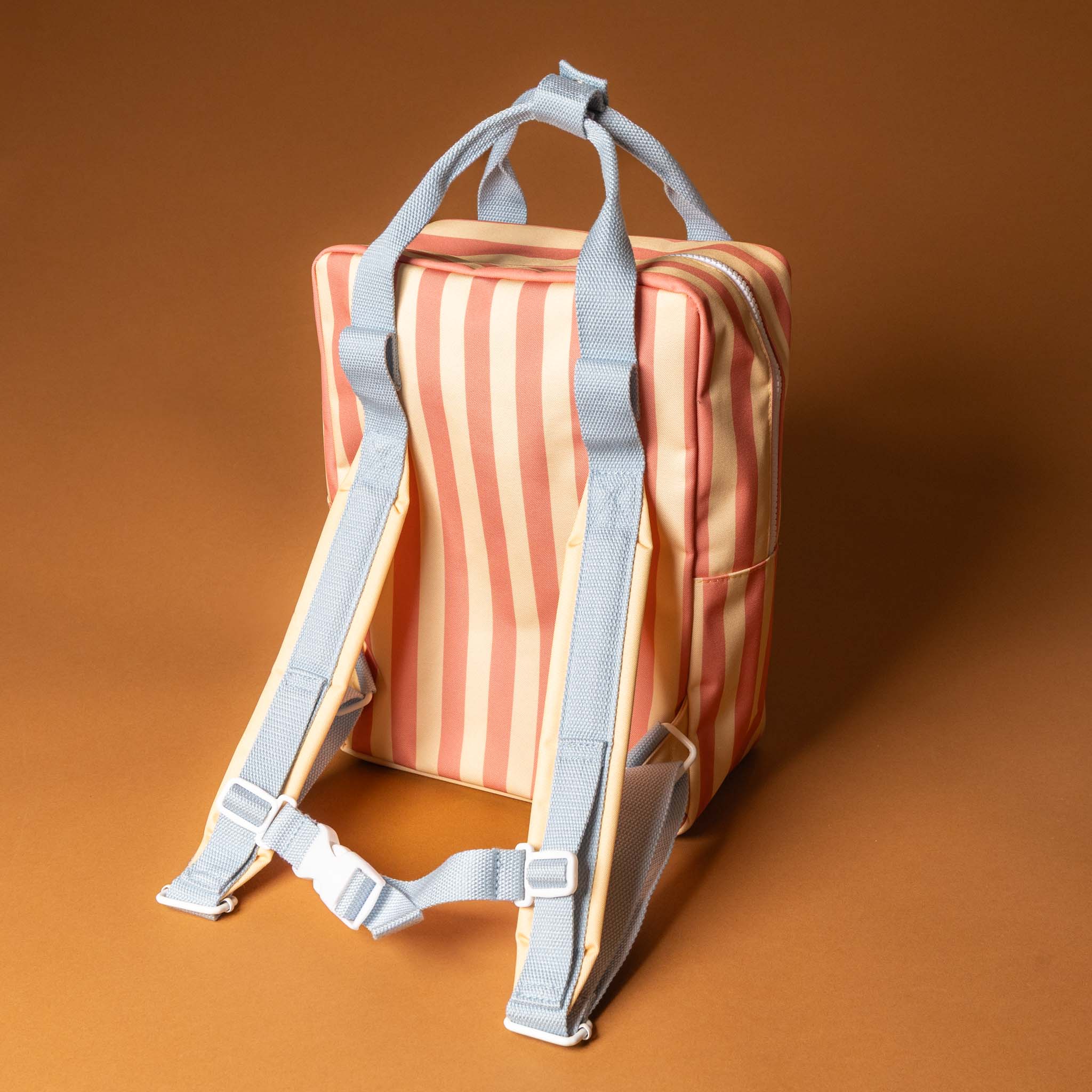 back-recycled-wonders-envelope-backpack-medium-melon-stripe-orange-front-pocket-blue-straps