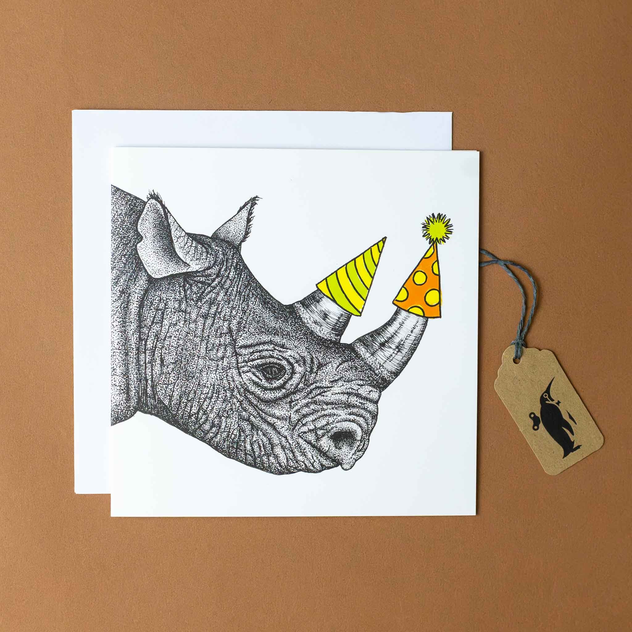 rhino-wishes-greeting-card-with-orange-and-yellow-green-striped-party-hats-on-two-horns