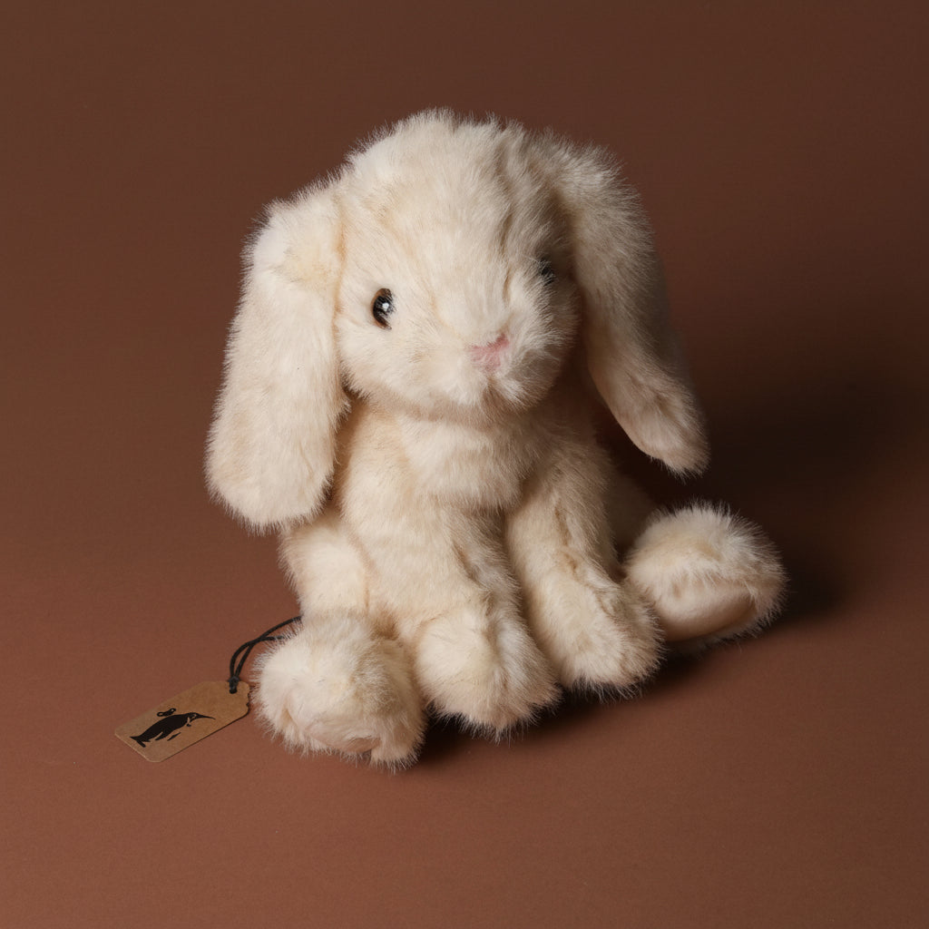 robbie-the-curious-cream-bunny-sitting-stuffed-animal