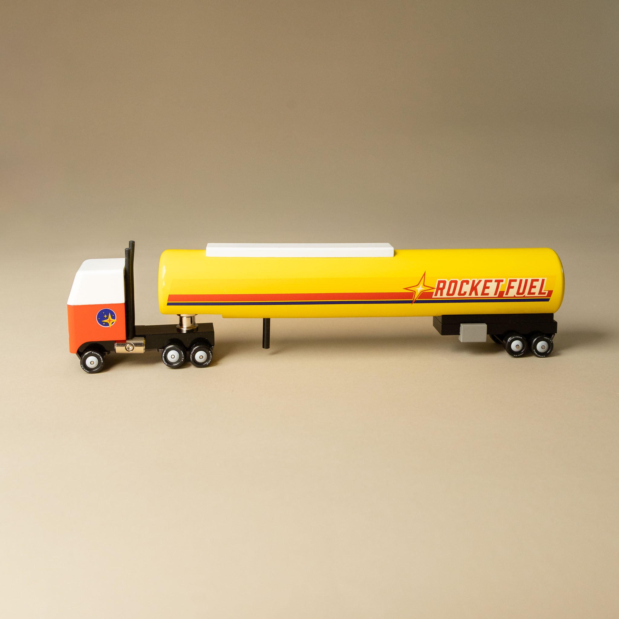 rocket-fuel-tanker with a yellow tanker labeled 'Rocket Fuel' on a beige background
