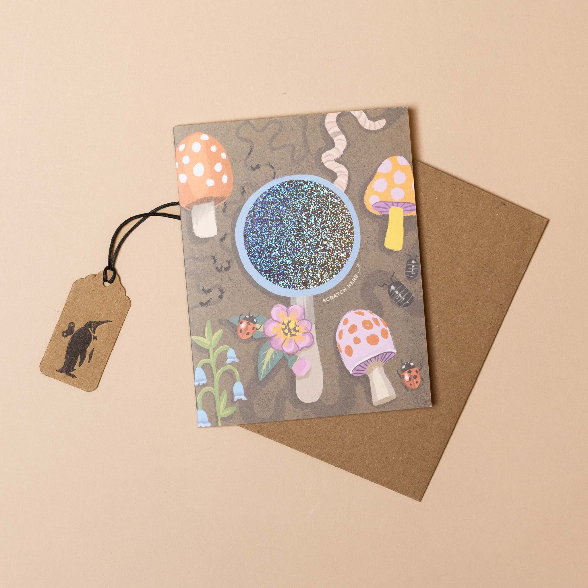  scratch-off-worm-birthday-wishes-greeting-card with a magnifying glass and mushroom design on a beige background