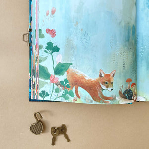 An illustrated page of Secret Journal | Moonlit Meadow with a playful fox