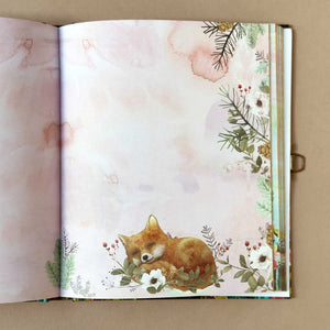 An illustrated page of Secret Journal | Moonlit Meadow with a sleeping baby fox