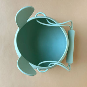 pistachio colored silicone bucket in bunny shape, view of the inside from above