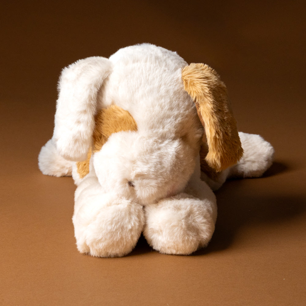 skipit-the-pup-large-cream-and-camel-stuffed-animal-laying