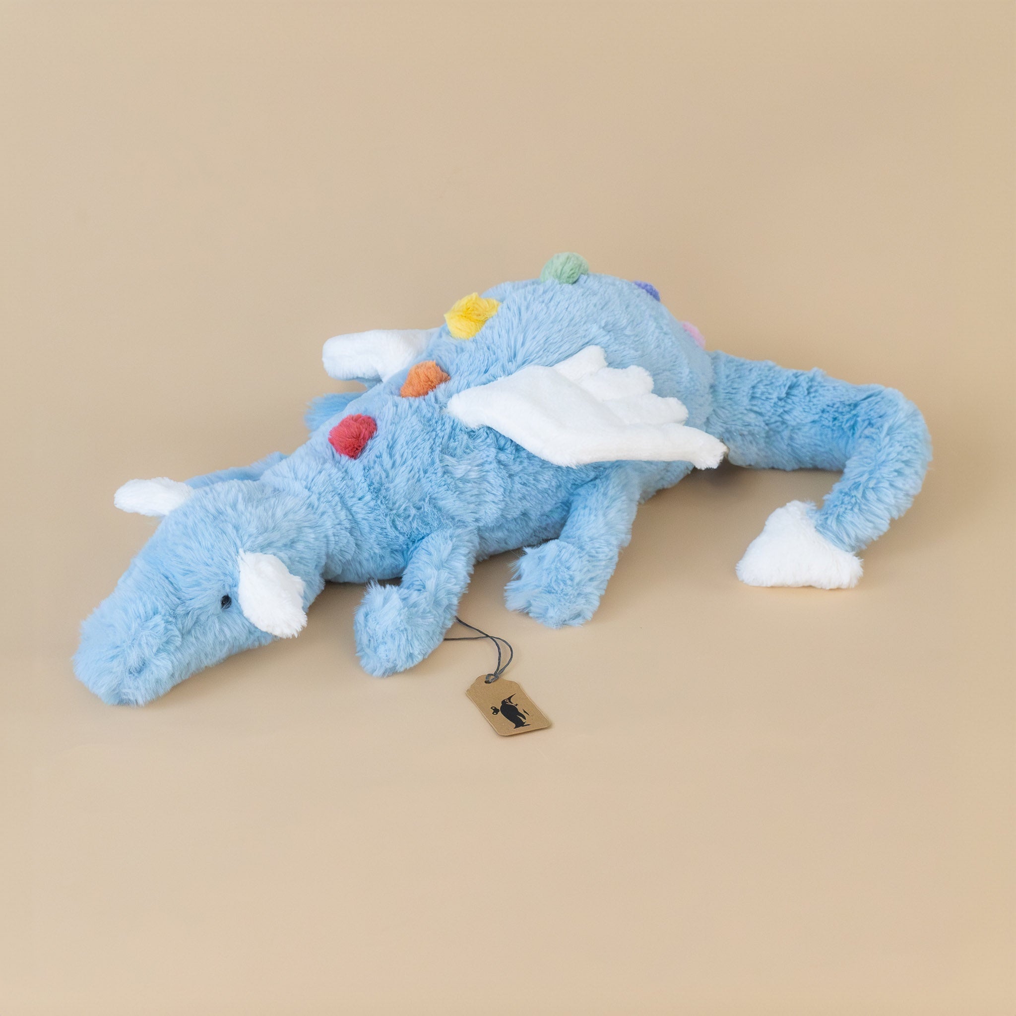 sky-dragon-medium-blue-with-white-wings-and-ears-along-with-rainbow-scales