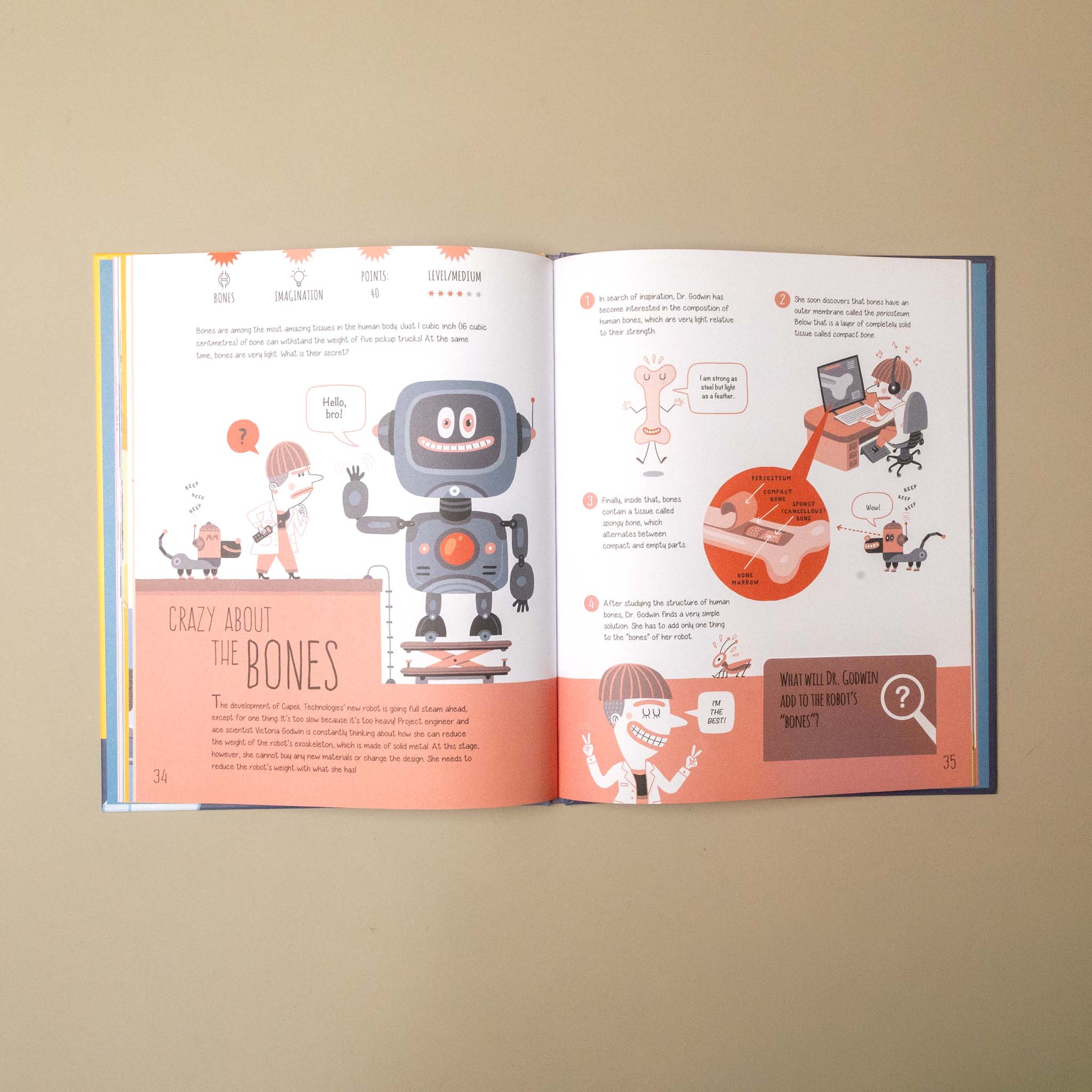 An open children's book showing illustrated pages about bones, photographed against a plain beige background.