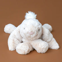Load image into Gallery viewer, smudge-oatmeal-rabbit-large-stuffed-animal-with-arms-crossed-big-ears-and-fluffly-tail