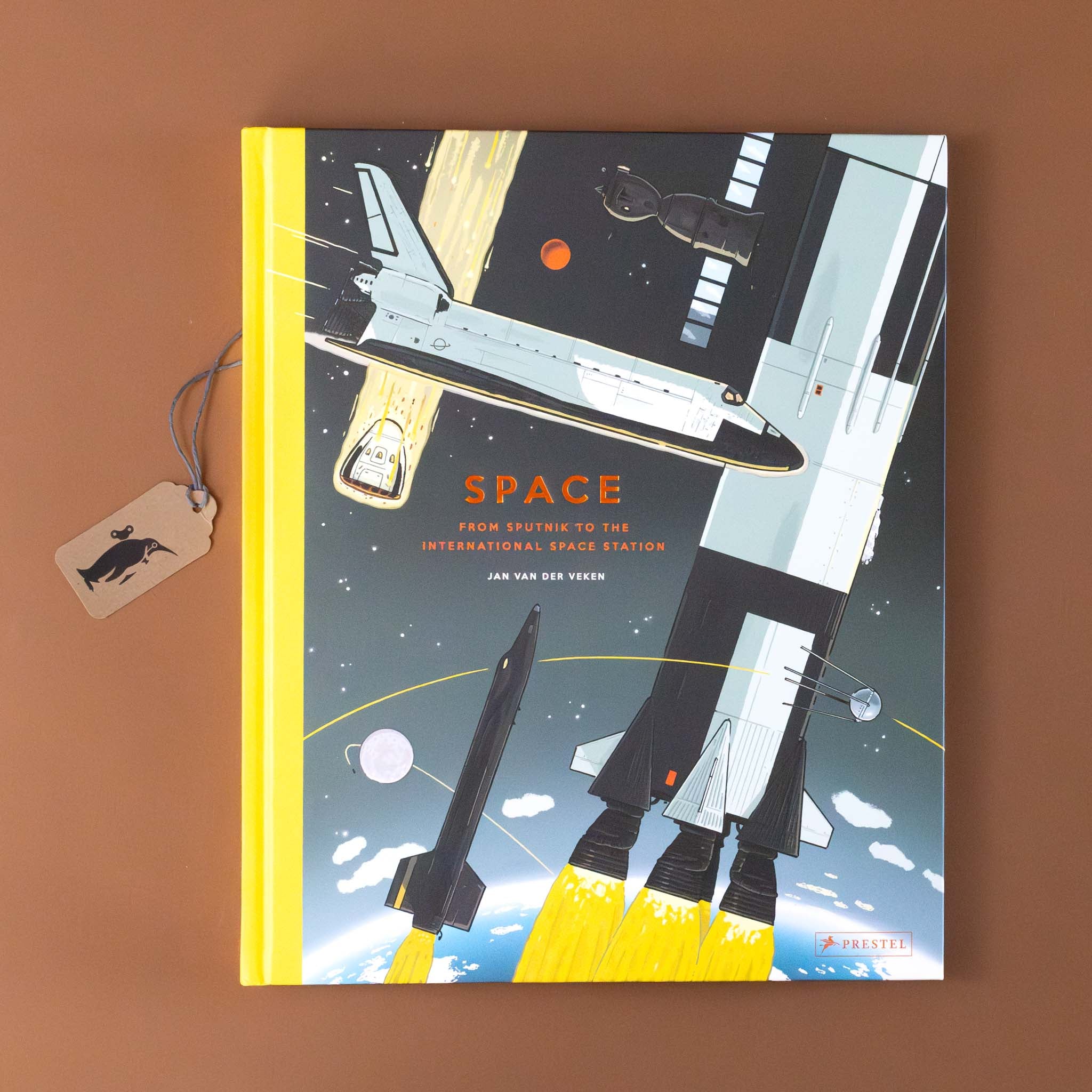 space-from-sputnik-to-the-international-space-station-book-cover-with-many-rockets-and-ships-in-space