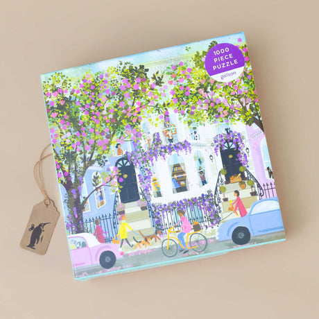 spring-terrace-1000-piece-puzzle-of-a-city-street-strewn-with-flowers-and-activities