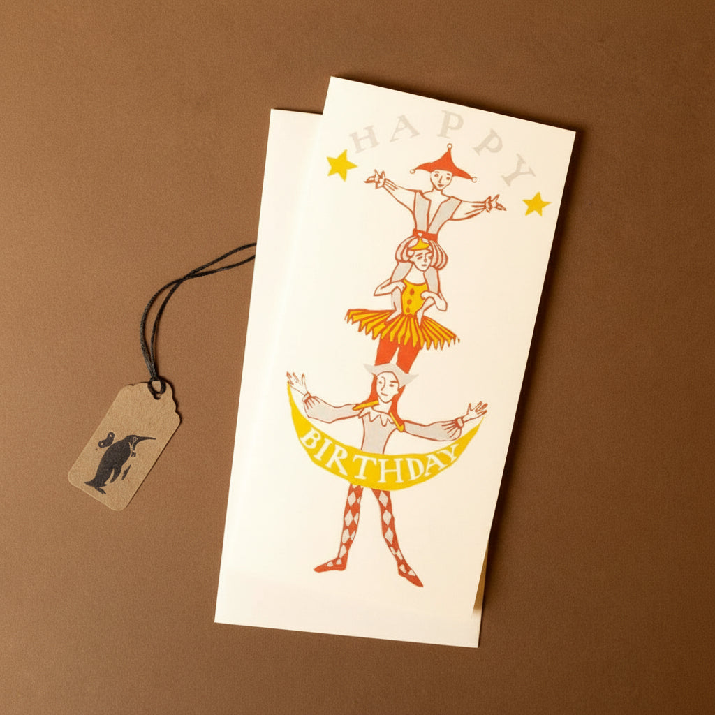 stackable-birthday-greeting-card with acrobats and 'Happy Birthday' text on a brown background