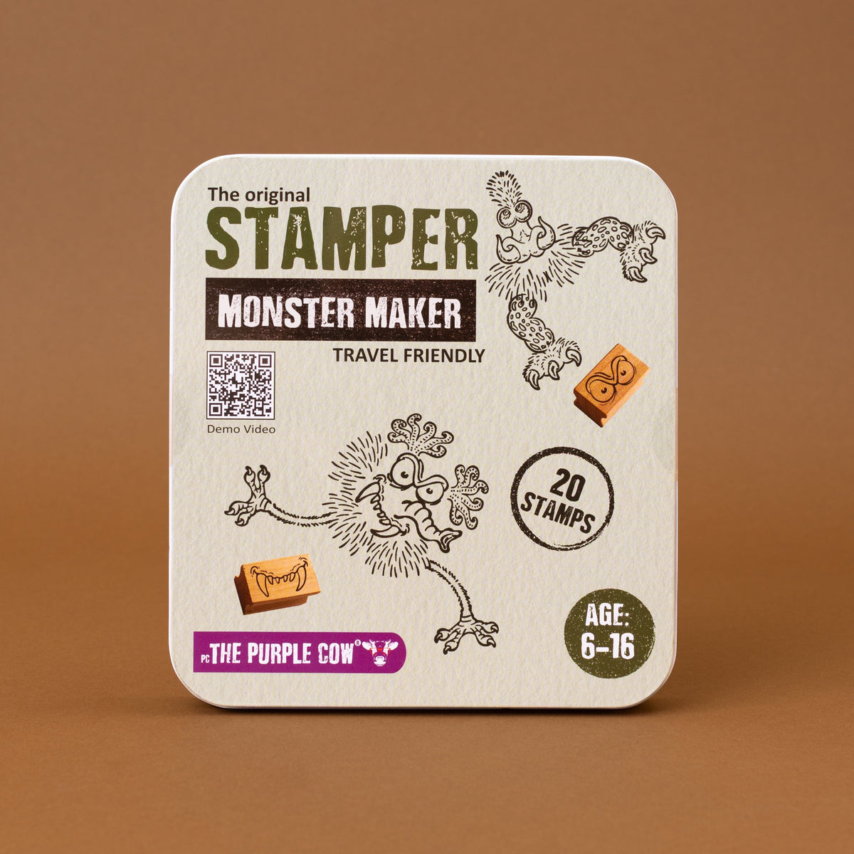 A square product box for 'The original STAMPER MONSTER MAKER' shown on a solid brown background. The box is off-white with black illustrations of cartoon monsters and text including 'TRAVEL FRIENDLY', '20 STAMPS', and 'AGE: 6-16'.